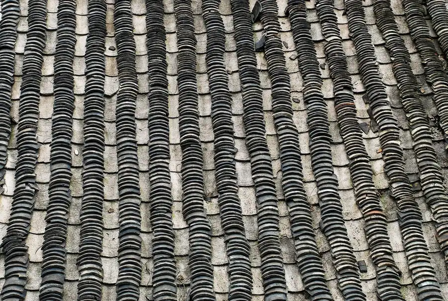 Close-up of a woven black-and-gray textured fabric pattern